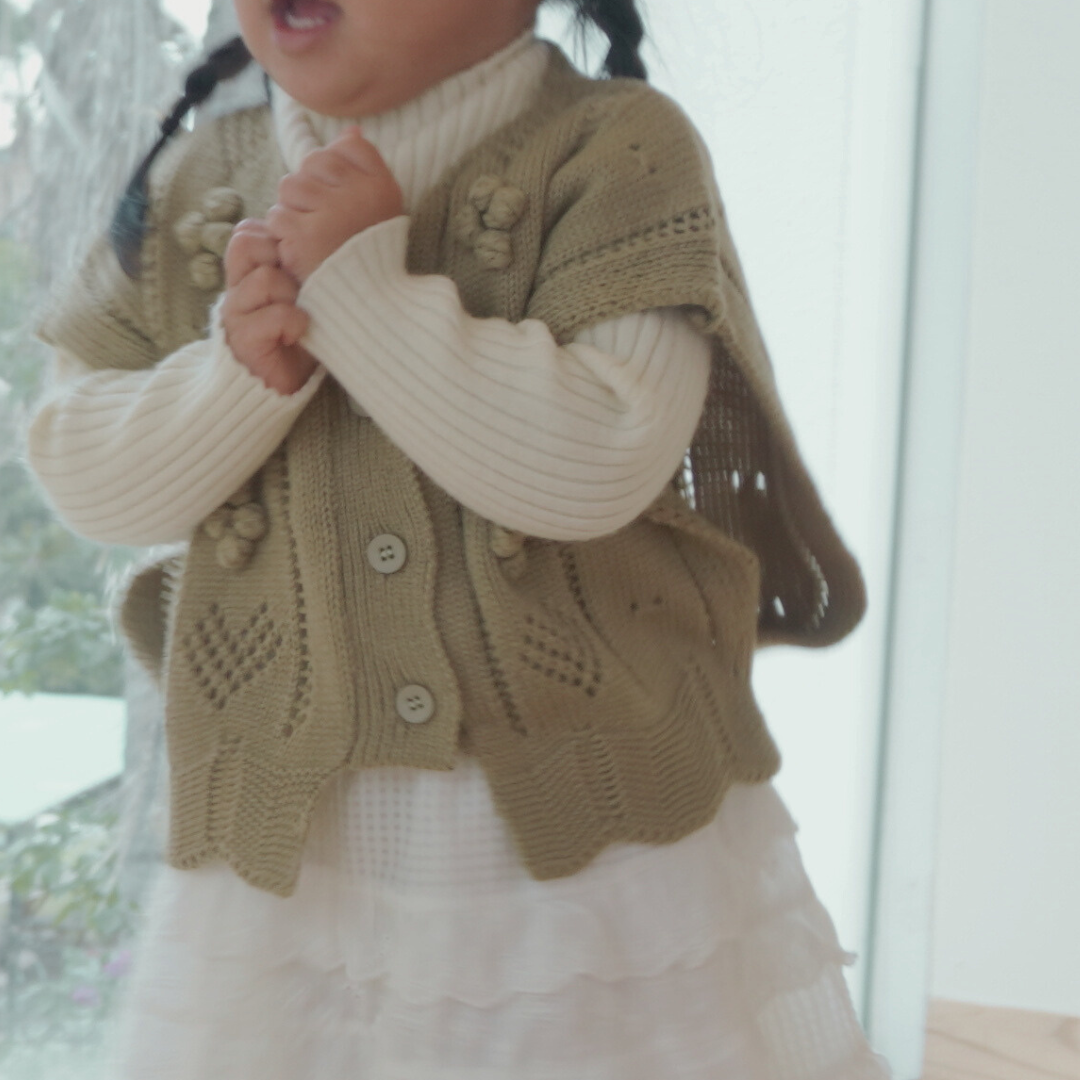 pon pon knit vest
