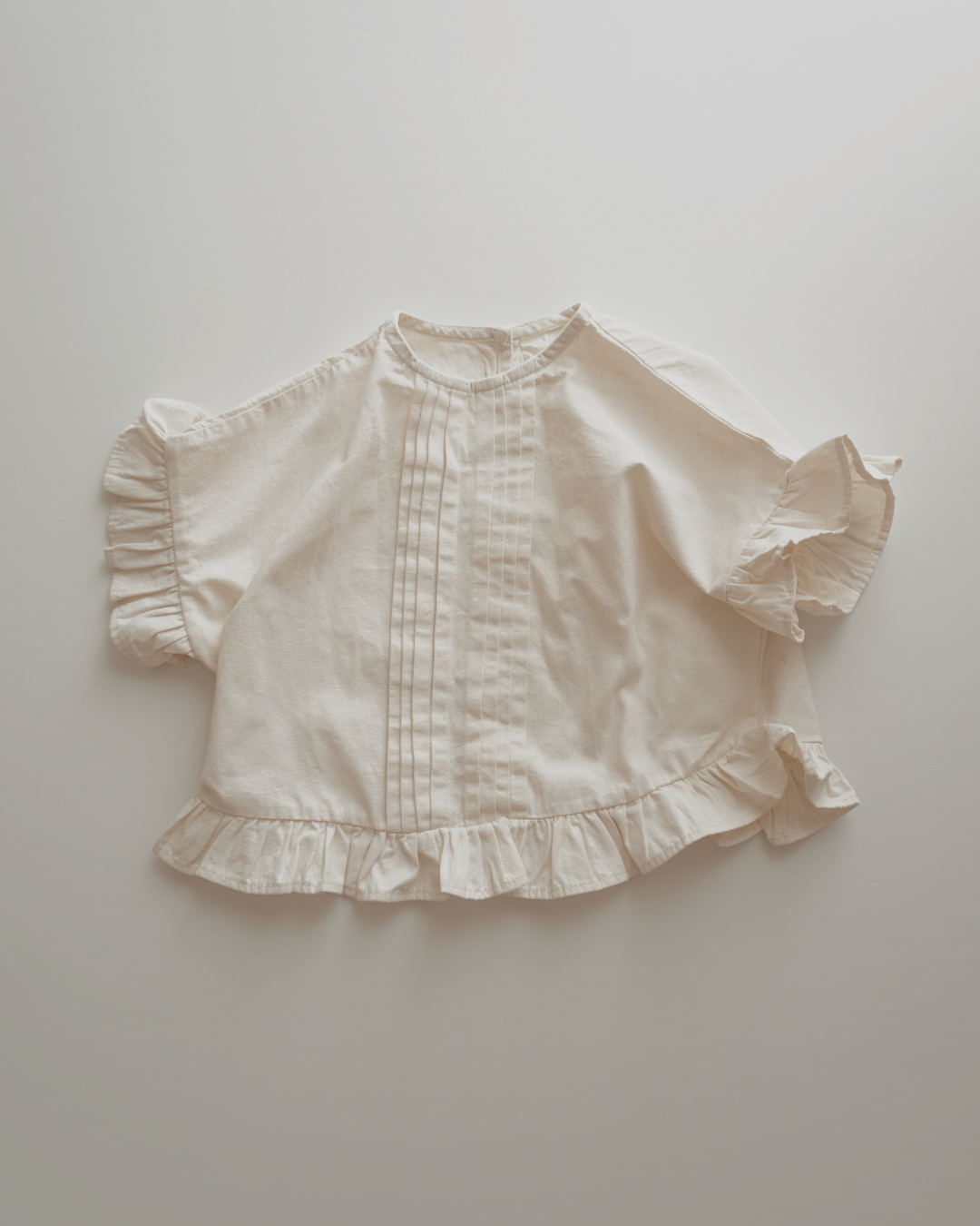 frill pintuck blouse